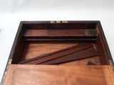 a wooden box that has a drawer inside of it