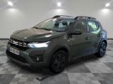 a grey suv parked in a room with a checkered floor