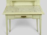 a small desk with a marble top on it