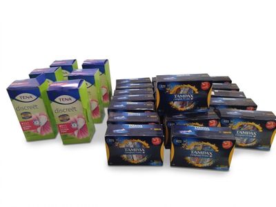 many boxes of tea on a white surface