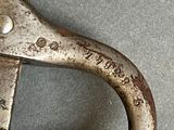 a close up of a pair of scissors on a table