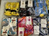 many pairs of socks that are sitting on a table
