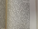 an open book that has a picture of a cat on it
