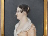 an antique portrait of a woman in a pink dress in a gold frame