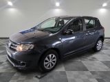 a picture of a grey car parked in a garage