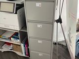 a desk with a printer and a printer on top of it