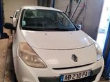 a white car that is parked in a garage