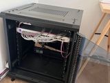 an image of a computer rack in a room