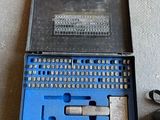 an image of a tool kit with a hammer and a drill