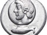 a close up of a coin with a man ' s face on it