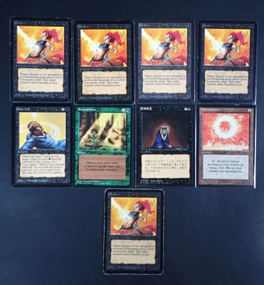 several cards are arranged on a black surface with a blue background