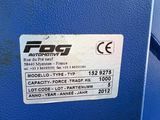 a close up of a blue machine with a tag on it