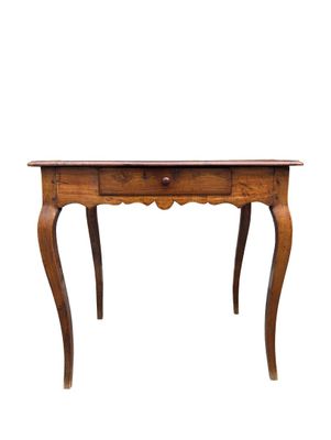 an image of a wooden table with a drawer underneath it