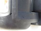a close up of a car ' s bumper with a hole in it