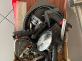 a box of tools sitting on the floor next to a sink