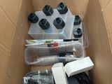 a cardboard box with a bunch of items inside of it