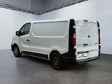 a white van that is parked in a room