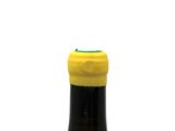 a bottle of wine that is sitting on a table