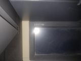 a small television sitting on top of a counter