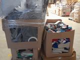 a cart full of items in a warehouse filled with boxes