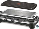 a close up of an electric grill on a white background