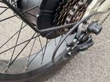 a close up of the front wheel of a bicycle