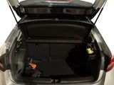 a trunk of a car with a luggage bag in it