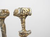 pair of antique silver candlesticks with gold leaf decoration