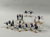 a lot of figurines that are on a table