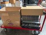 a cart that has a bunch of boxes on top of it