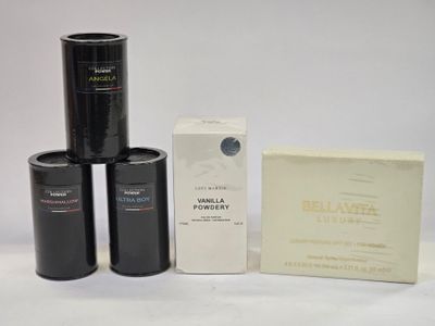 several different types of camera lenses and boxes on a white surface