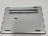 an open laptop computer sitting on top of a white table