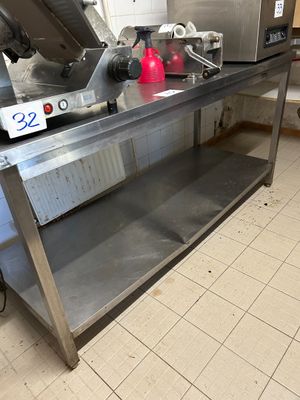 Table en inox 180 x 70 cm avec étagère inférieure (usagée). - Photo 1