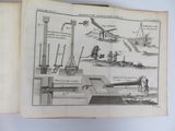 an old book with a drawing of a machine on it