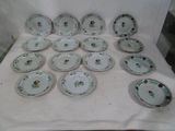 a lot of plates that are sitting on a table