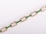 an emerald and diamond link bracelet
