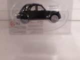a small black car in a clear plastic box