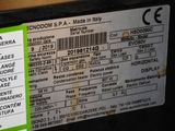 une étiquette apposée à l'arrière d'une machine qui ne fonctionne pas