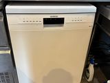 a dishwasher and a stove in a kitchen