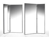 three mirrors are shown in a row on a white surface