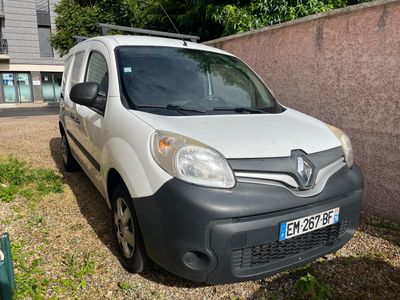 a white van parked on the side of the road