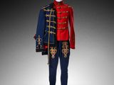 a mannequin dressed in a red and blue uniform with a skull on it