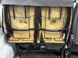 two yellow boxes in the back of a truck