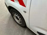a white van with a red stripe on the side of it