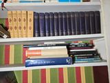 many books on the shelves in the room