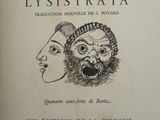 an old book with a drawing of a man and a woman ' s faces