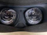 a close up of the headlights of a motorcycle
