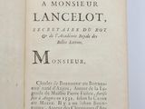 an open book with a black and white image of a man on a horse