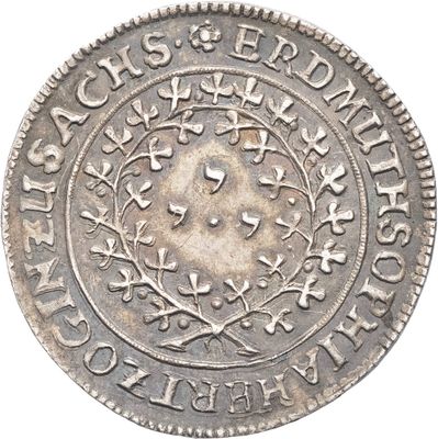 gros plan d'une pièce de monnaie sur fond blanc