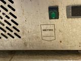 a close up of a microwave oven with the door open